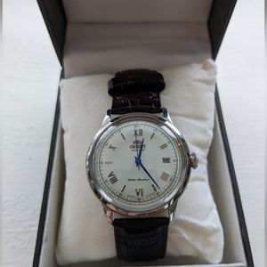 Orient Bambino V2 with 4 straps